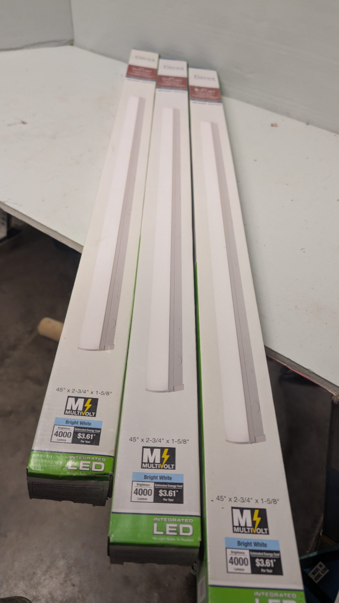 Three MaxLite 4 ft LED Strip Light Fixtures in Boxes