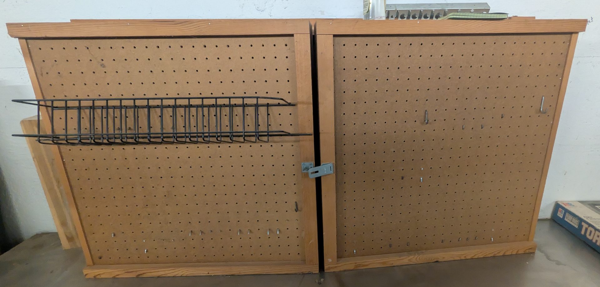 Wood Wall-Mount Pegboard Storage Cabinet with Sliding Doors and Wire Basket