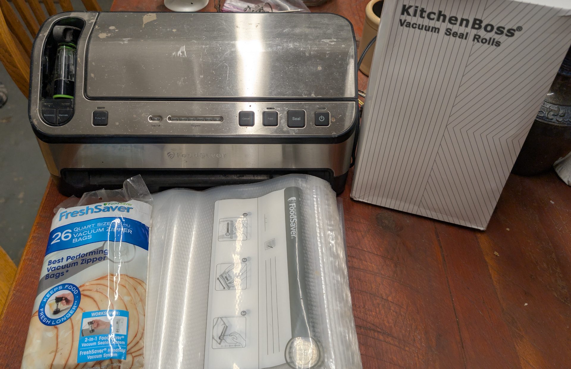 FoodSaver Vacuum Sealer with KitchenBoss Rolls and FreshSaver Zipper Bags